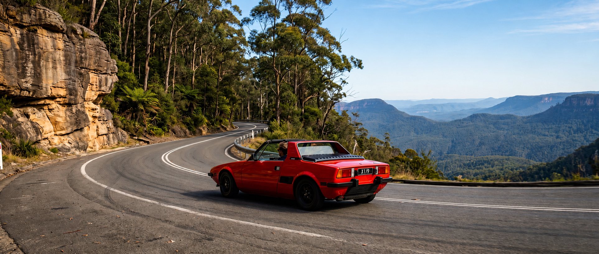 A Fiat X1/9 on Bells Line of Road in the Blue Mountains